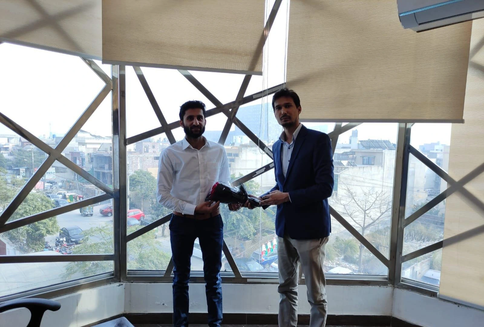 iDevNerds team members exchanging a gift